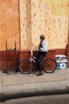 Columbia Man On Bicycle With Hat 1 100x150